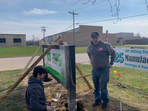 Black-Raptor-Liner-on-Industrial-Sign