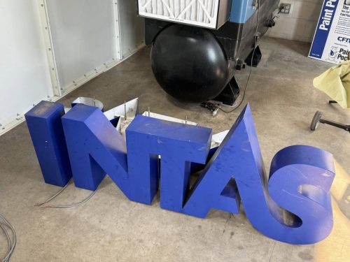Worn-Out-Cintas-Sign-Letters